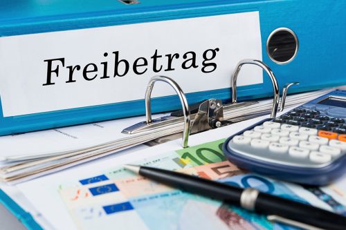Aktenordner und Taschenrechner